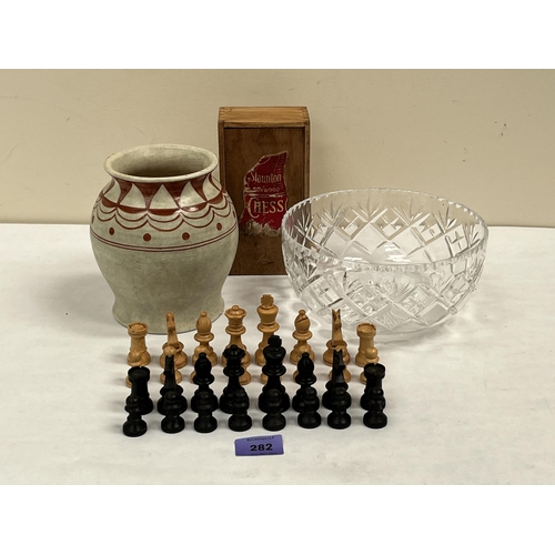 282 - A set of Staunton boxwood chess pieces; An Art-Deco vase and a cut glass fruit bowl