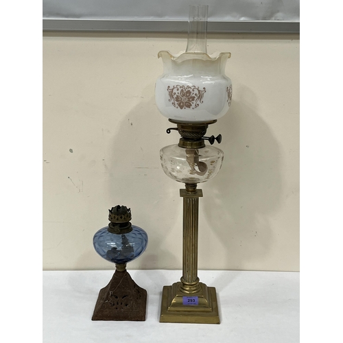 293 - A Victorian brass corinthian oillamp and another smaller example