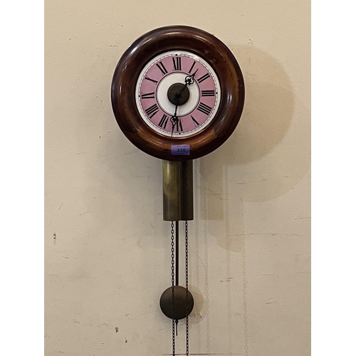 330 - A late 19th century postman's alarm clock. 11' diam