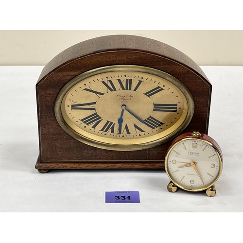 331 - An early 20th century mantle clock and a Looping alarm clock