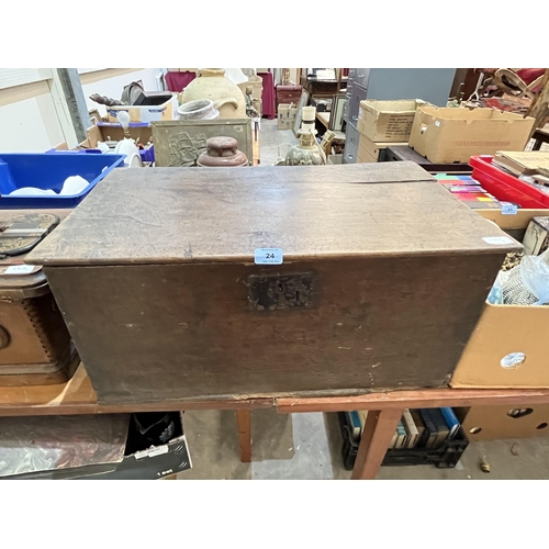 24 - A 19th century oak chest, 27' wide (A.F.) and a sewing machine