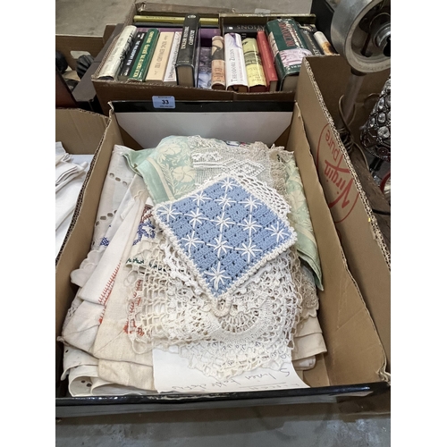 33 - Two boxes of table linen