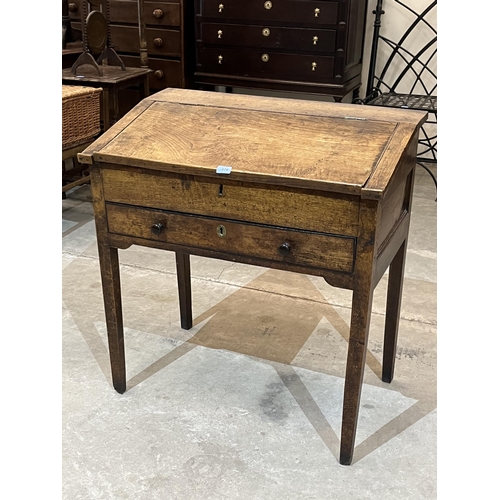 378 - An early 19th century joined oak clerk's bureau, the interior with three drawers. 33' wide