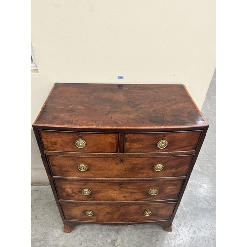 391 - A George III mahogany bowfronted chest, the crossbanded top over two short and three long cockbeaded... 