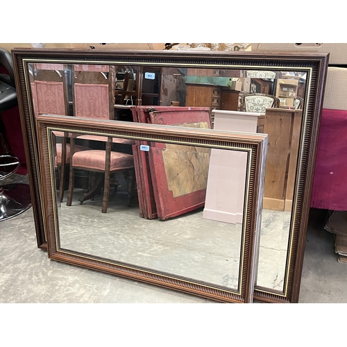 401 - Two wall mirrors with bevelled plates, the larger 51' wide