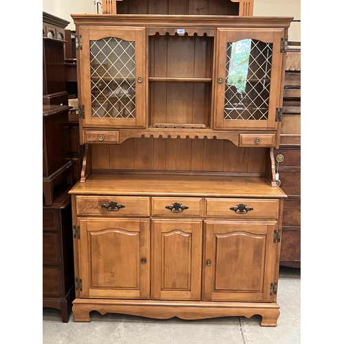 405 - A modern dresser with raised upper part. 47'w x 68'h