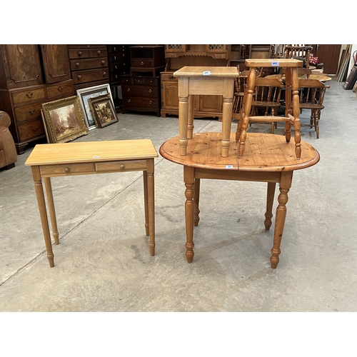 407 - A small pine dining table; a side table; a stool and an occasional table (4)