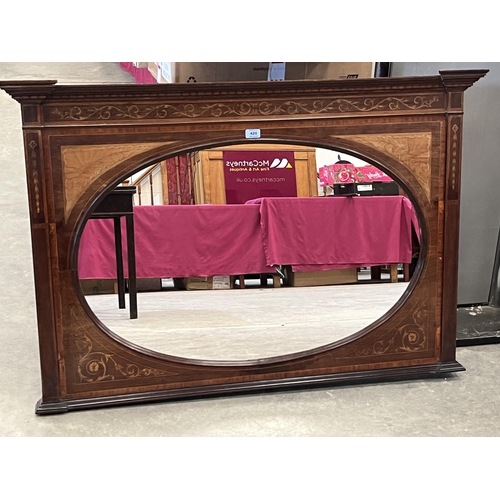 420 - An Edward VII mahogany line and foliate inlaid overmantle with oval plate. 48' wide
