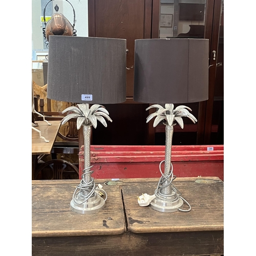 499 - A pair of metal palm tree table lamps. 17' high excluding fitting