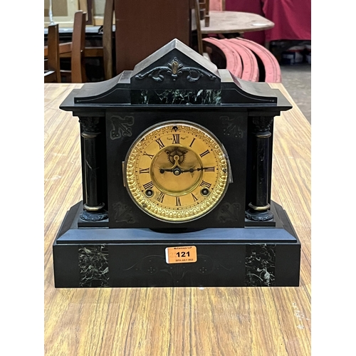 121 - An early 20th century French black slate cased mantle clock, the gilt dial with Brocot escapement. 1... 