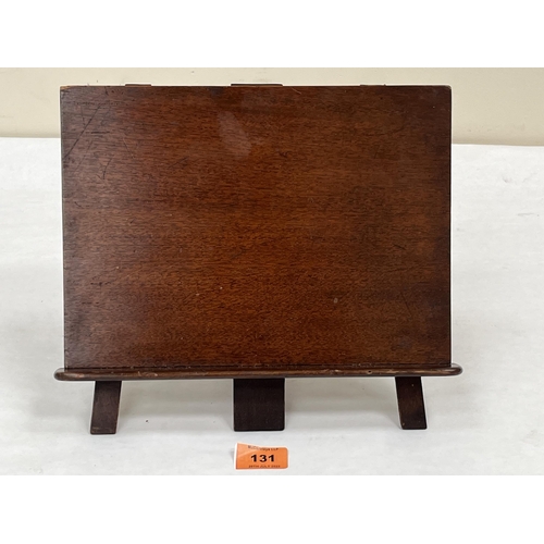 131 - A 19th century mahogany book stand with ratchet strut back. 11½' wide.