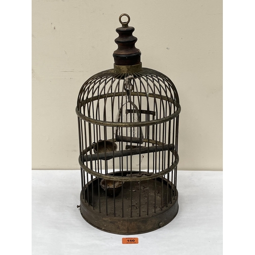 150 - A brass bird cage. 19' high
