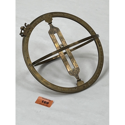 169 - A gilt brass universal ring dial. 8'diam