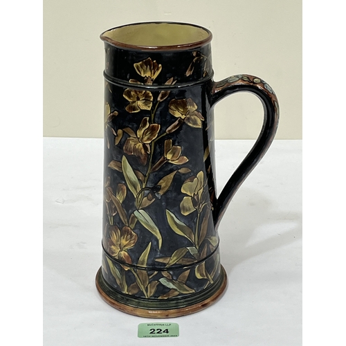 224 - A Victorian Doulton Lambeth Faience tapered jug. 10¼