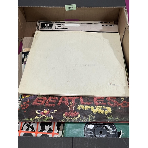 267 - A box of Beatles LPs, EPs and 7