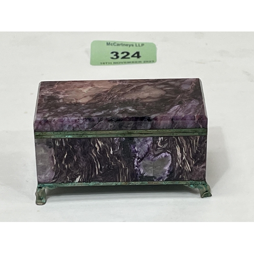 324 - A 19th century hardstone casket. 3