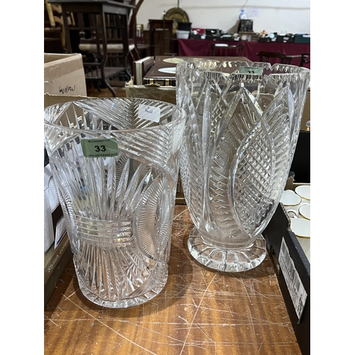 33 - Two cut glass flower vases. The larger 12½