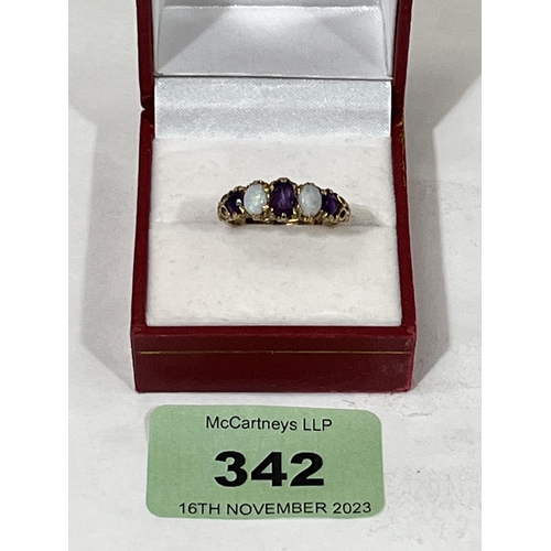 342 - A five stone amethyst and opal ring. In gold marked 375. 3.1g gross. Size Q.