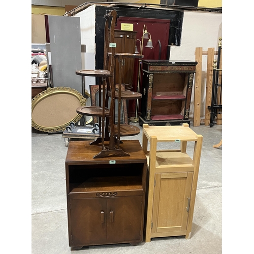 386 - An oak folding cakestand and two small cupboards. (3).