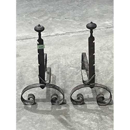 446 - A pair of 19th century wrought iron and irons. 18½