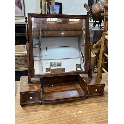 575 - A late 19th century mahogany dressing mirror, the base with two drawers. 26½