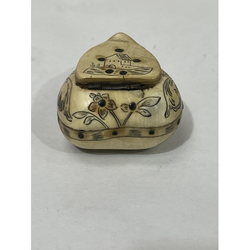 190 - A 19th century Tyrolean Vipiteno horn heart form snuffbox engraved with motto, a lady at a well, a b... 