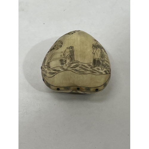 190 - A 19th century Tyrolean Vipiteno horn heart form snuffbox engraved with motto, a lady at a well, a b... 