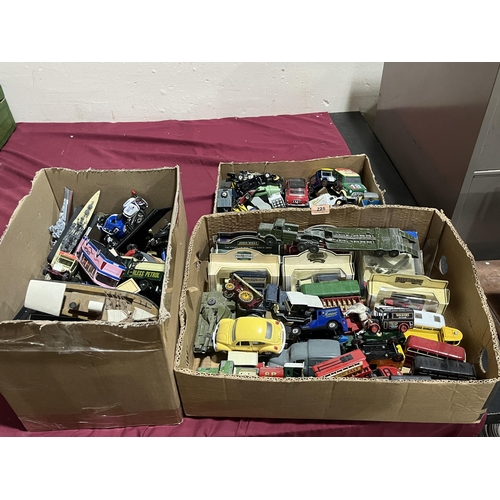 225 - Three boxes of diecast model vehicles.