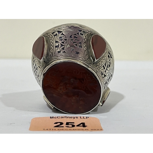 254 - An eastern silver niello and agate set seal. 2¾