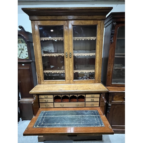 351 - A fine quality Victorian burr oak secretaire bookcase, the upper part with three tooled leather and ... 