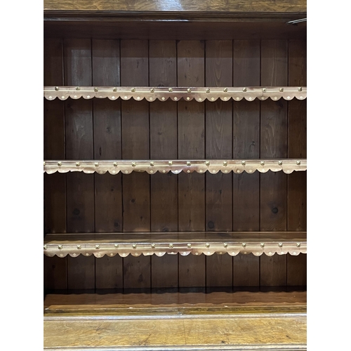 351 - A fine quality Victorian burr oak secretaire bookcase, the upper part with three tooled leather and ... 