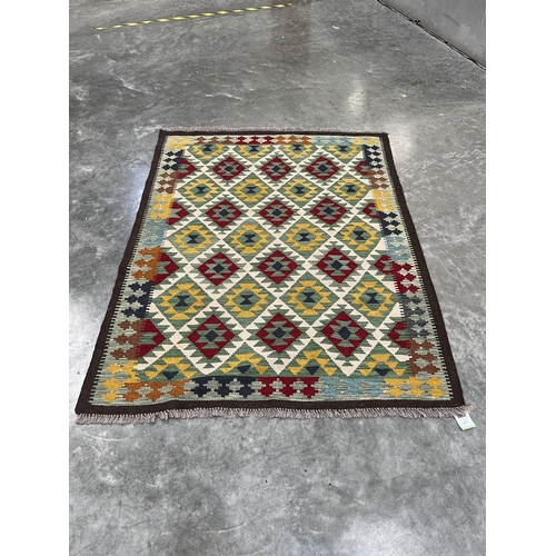 377 - A Maimana Kilim rug. 1.87m x 1.47m.