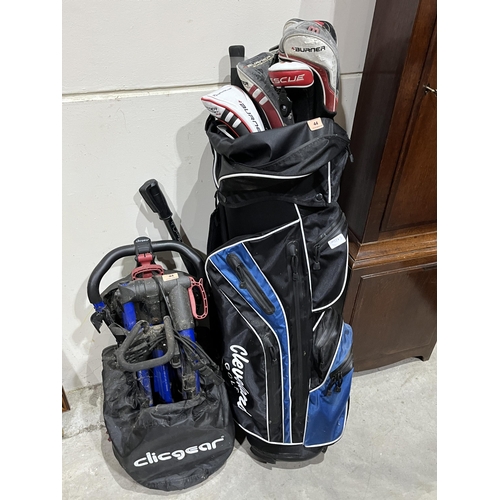 44 - A bag of golf clubs with a folding trolley.