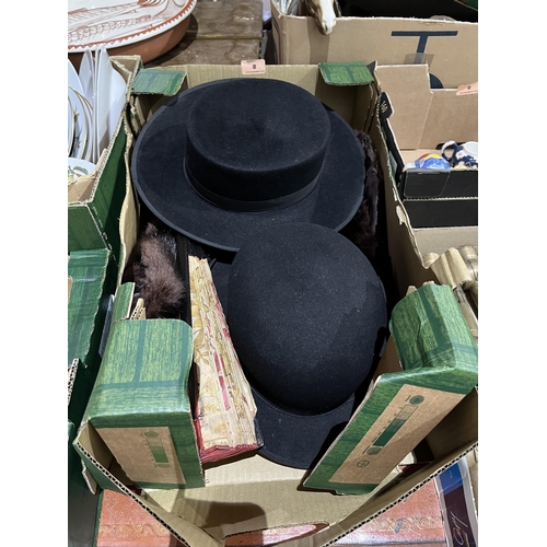 8 - A box of hats, fur stole and a lady's fan.