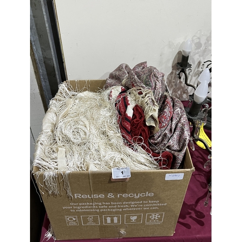 1 - A box of textiles.