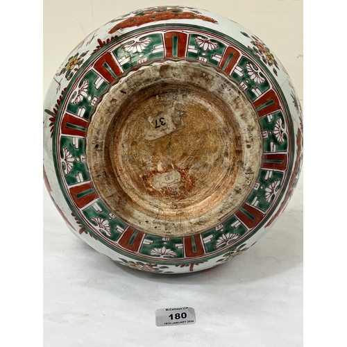 180 - A Chinese wucai kendi , enamelled in colours with birds and foliage. 15