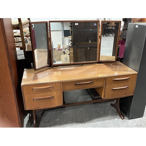 292 - G-Plan. A teak single wardrobe and dressing table.