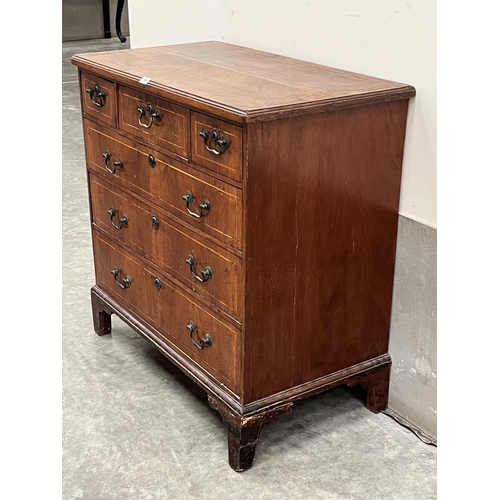 366 - A George II walnut and line inlaid chest, the moulded top over three short and three long graduated ... 