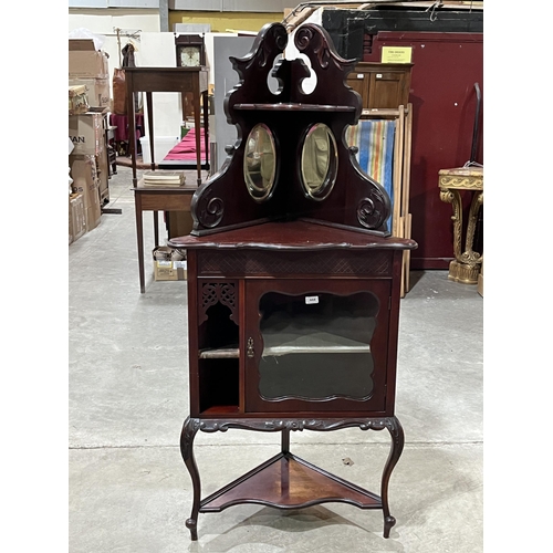 444 - An Edward VII mahogany corner display cabinet. 64