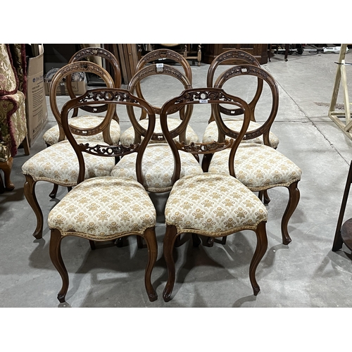 455 - A set of six and a pair of Victorian walnut salon chairs on French cabriole forelegs (8).