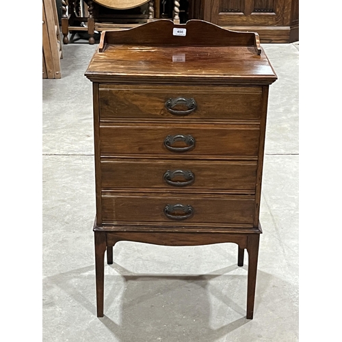 456 - An Edward VII mahogany music chest of four fall front drawers. 20