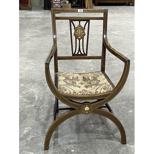 465 - An Edward VII mahogany and inlaid 'X' framed armchair.