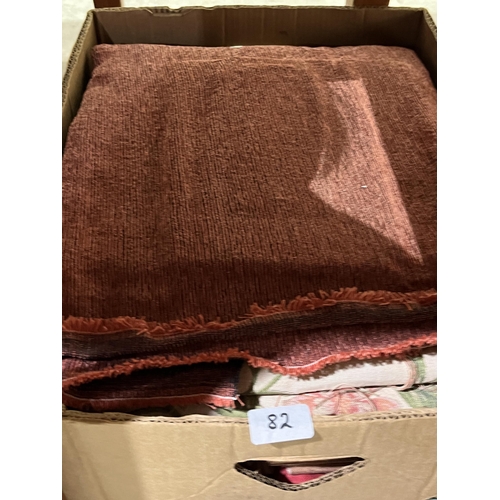 82 - Four boxes of fabric and linen