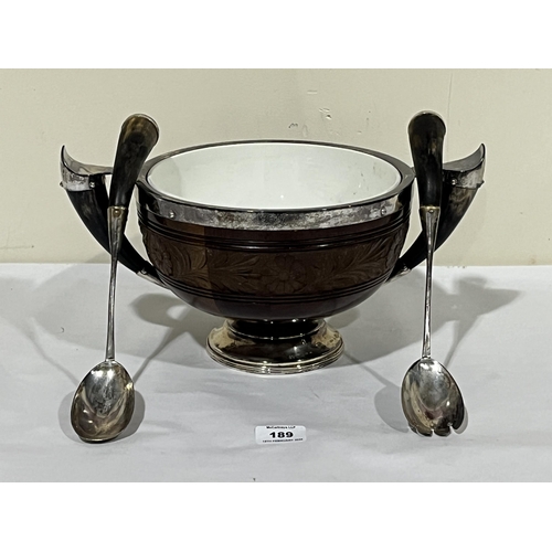 189 - A Victorian carved mahogany and silver mounted fruit bowl, the bowl and silver servers with horn han... 