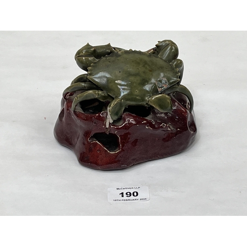 190 - A Continental Palissy type glazed earthenware model of a crab on a rocky base. 6