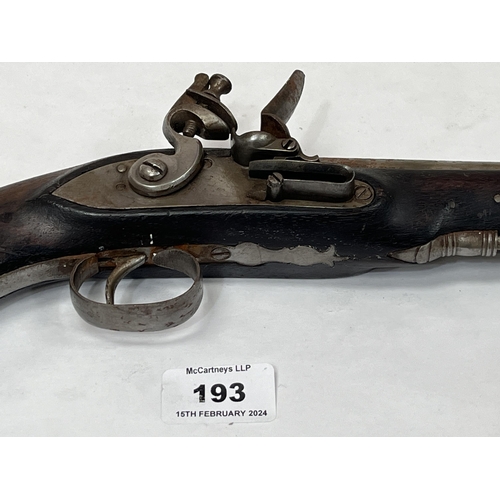 193 - A flintlock holster pistol with rosewood stock. 12