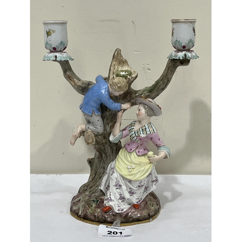 201 - A 19th Century Dresden porcelain two light figure group candelabrum. Crossed swords in underglaze bl... 