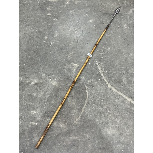 209 - A bamboo hafted fishing spear. 57