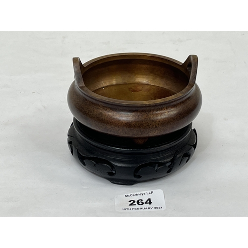 264 - A Chinese bronze bowl on stand. 4