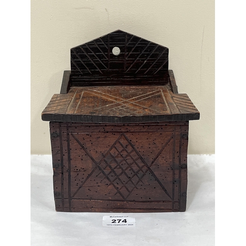 274 - A 19th Century carved oak salt box. 7